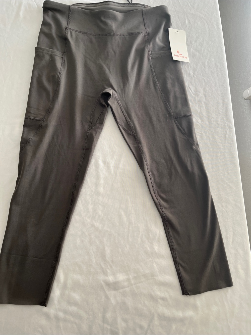 Leapstride leggings SMALL with side pockets, back zip pocket and shirt loop